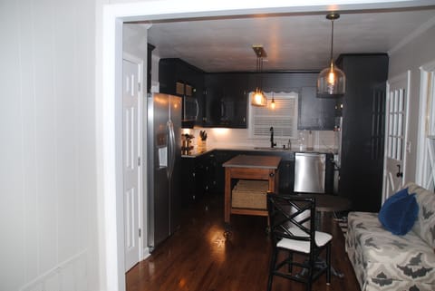 updated kitchen with new appliances and convenient island workspace