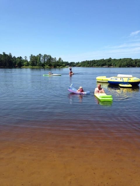 Swim or float, fun all day on the sandy beach!