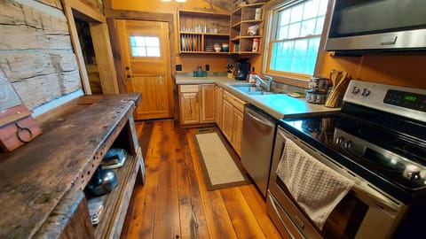 Kitchen is fully stocked for meal prep.