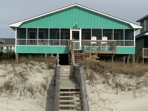 View of the cottage from the beach. 