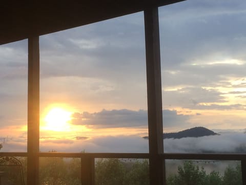 above the clouds sunset after a rain.