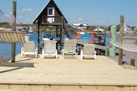 new deck with chairs and hammocks