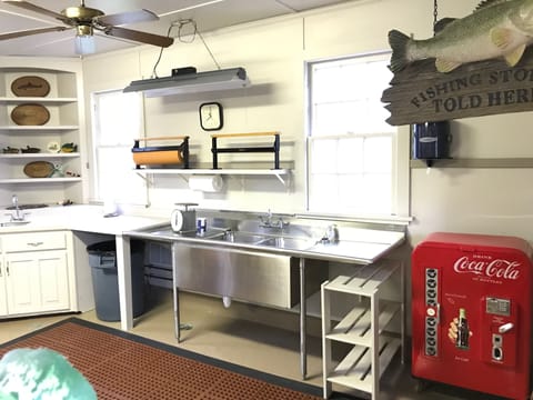 Lodge kitchen: fridge, microwave, coffee makers - a common area.