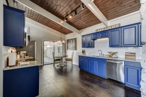Sliding door leads out to deck and outside Grill and picnic table 
