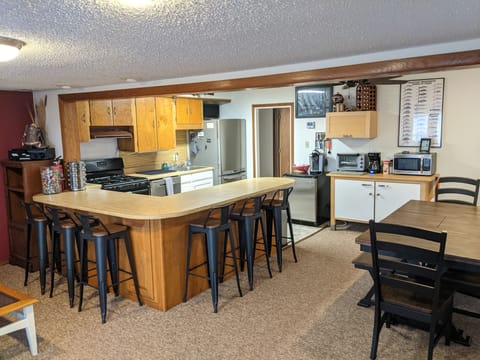 Main house kitchen and dining area.