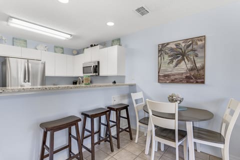 Seating for 3 at the Dining Table, with Additional Seating at the Counter