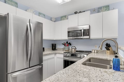 All new Stainless Steel Kitchen Appliances and New Cutlery