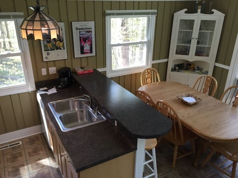 Dining room and breakfast bar seats 10!