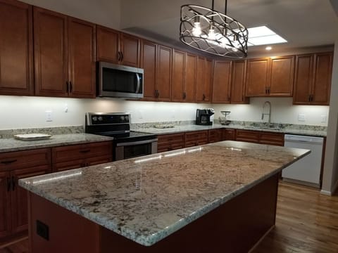 Over-sized island for preparing family meals.