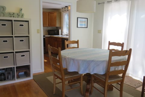 Dining Area with Access to Kitchen, Deck and Sunroom