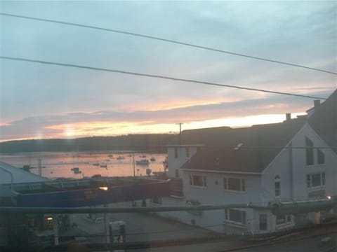 Damariscotta Harbor view from living room and front bedroom. Beautiful sunsets.