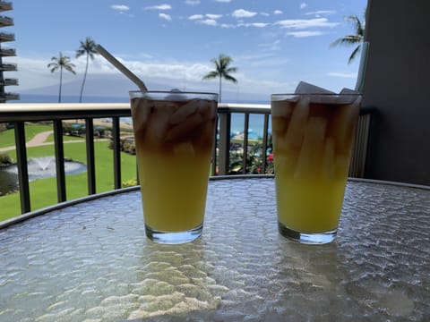 Cocktail height table and chairs on lanai.  
