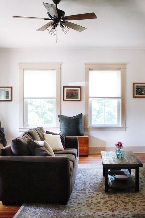 The Living Room has a wood burning stove and a flat-screen TV with Netflix, Hulu