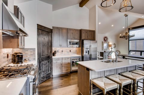 Kitchen island has seating for 4.