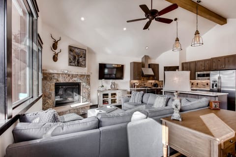 Comfortable seating for the fireplace and TV.