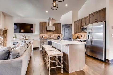 Large kitchen with pantry in the corner.