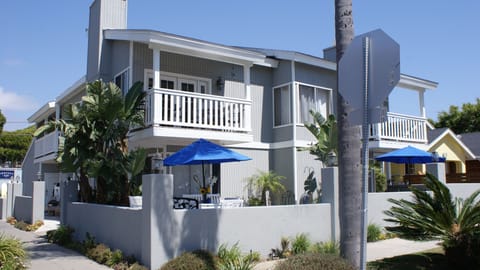 FRONT SHOWING UPPER AND LOWERED PATIO