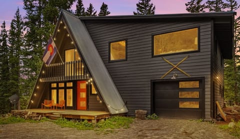 Dusk to dawn edison lights on A-frame and driveway