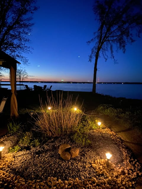 Beautiful View  of the lake from the yard at night.