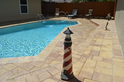 Very private backyard HEATED pool.