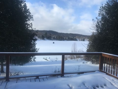 Gaze out at the lake through walls of windows throughout your toasty warm home