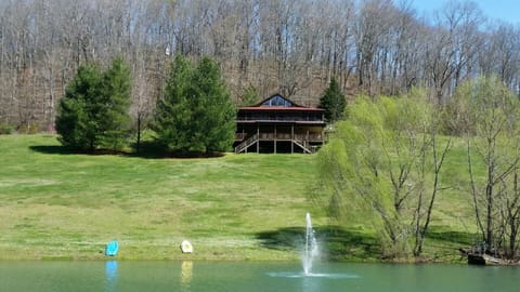 Home sits perched on a hill with panoramic views.