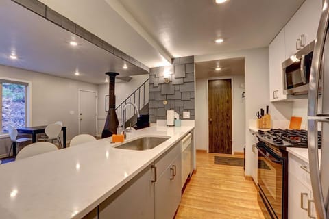 All new kitchen counters, cabinets, utensils, pots/pans, dishes, fridge.