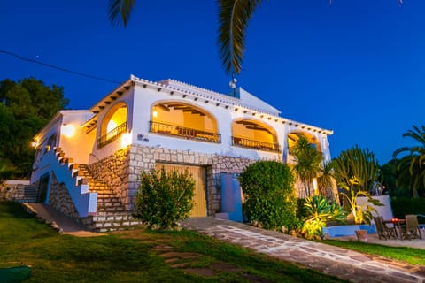 The villa from the entrance of the property.