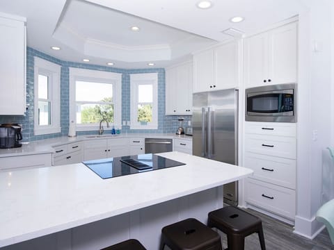 Well stocked with Dishes, Cooking Utensils, large & small Appliances