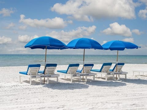 Complimentary Daily Beach Service with 8 Chaise Lounges with Umbrellas March 1 - October 31.