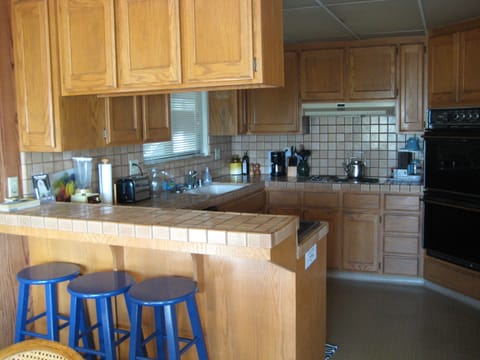 Full featured and well stocked kitchen.