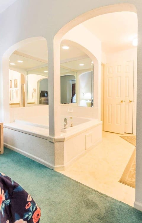 Master bedroom has an ensuite with a tub.