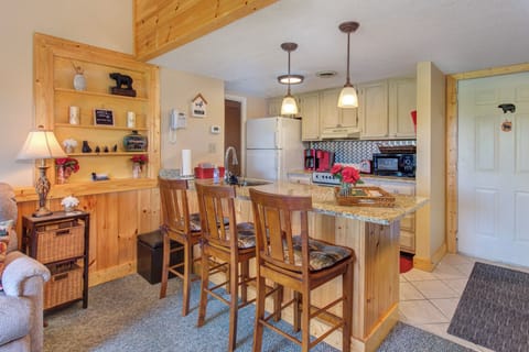 Bar stools make it handy to snack at the granite counter