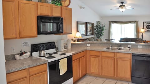 The spacious Kitchen has quality full-size appliances and lots of counter space.