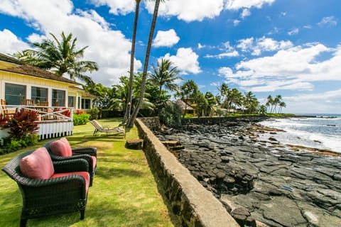 enjoy the expansive lawn with sun loungers and chairs to enjoy the sights and sounds of the ocean.