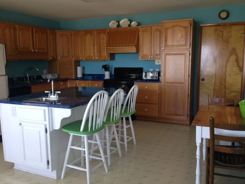 Bar seating at kitchen island.