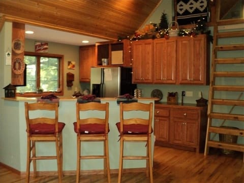 Kitchen: Dishwasher, stove/oven, refrig, coffee maker, dishes, silverware, pots