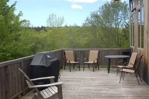 A large deck off second floor almost doubles the summer living space. 