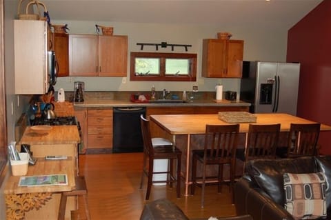 Kitchen has new appliances and is fully equipped.