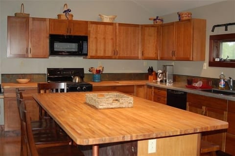Kitchen island easily seats 8 people for meals.