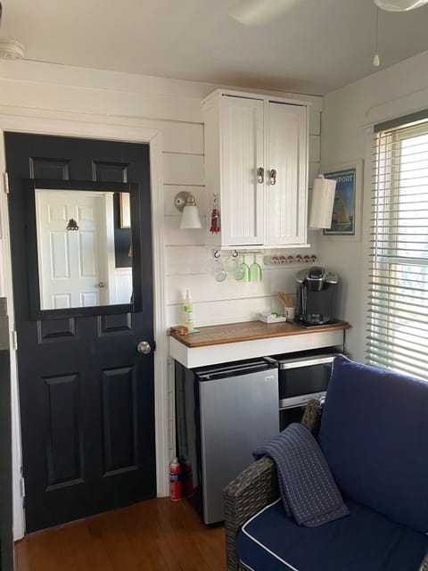 MINI FRIDGE , KUERIG COFFEE MACHINE AND MICROWAVE 