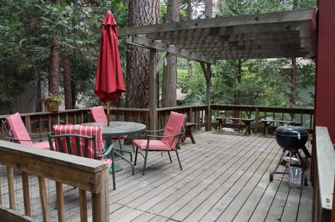 The back deck. A great place for a BBQ or relaxing under the cedars!
