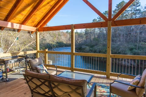 Incredible river views in every direction. Large patio sitting and dining area.