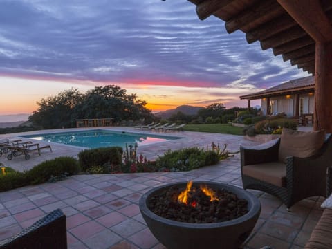 Enjoy a beautiful sunset by the firepit.