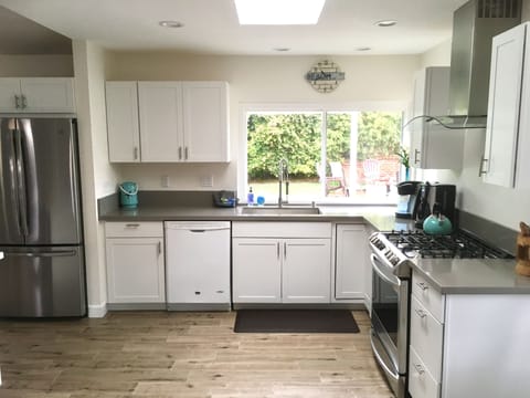 Beautiful new frig, range, cupboards and counters New lighting & skylight space