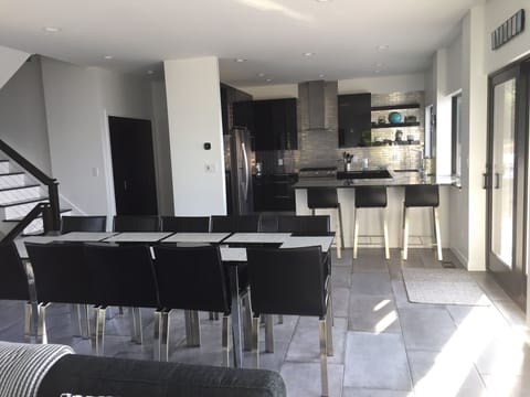 2nd floor kitchen/dining/great room right off of huge deck with gorgeous view