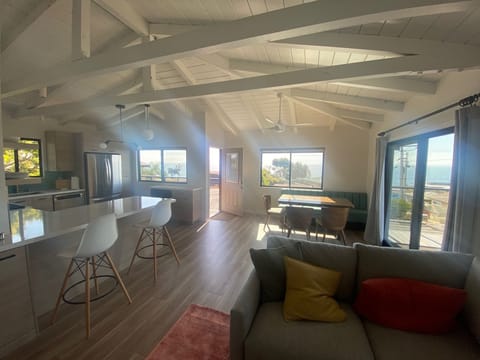 Sun is streaming in! - West facing photo with ocean views from windows and deck