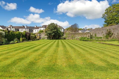 Stroll or play ball with your friends in high walled secluded rear gardens