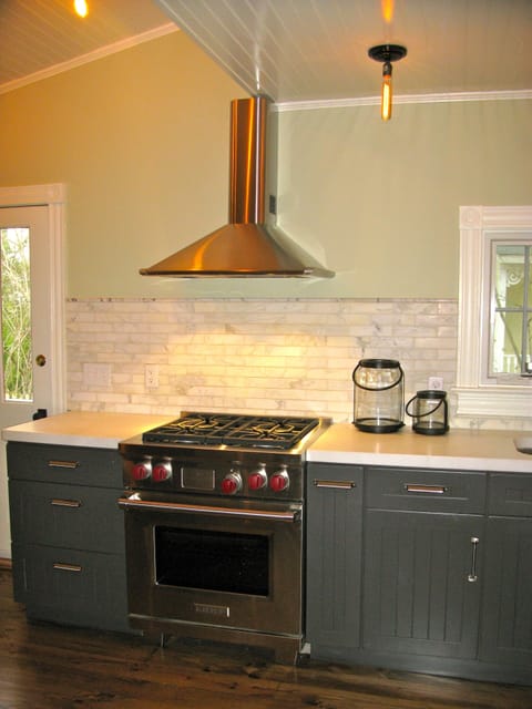 Kitchen w Wolf range & marble countertop