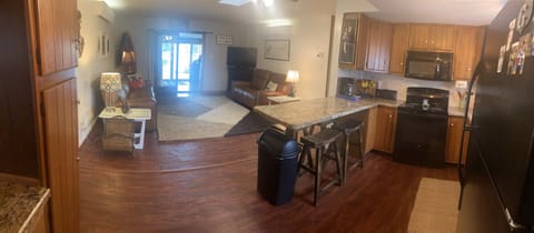 Living Room & Kitchen with gorgeous views out to the lake.